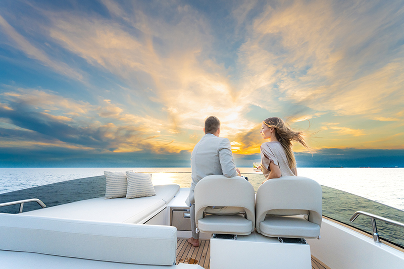 man-and-woman-sitting-on-top-deck-